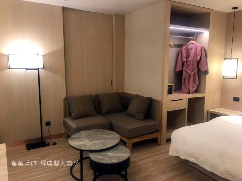 Cama o camas de una habitación en 菓菓輕旅