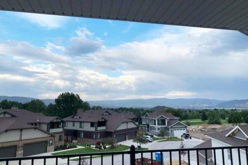 a view from the balcony of a house at Midway to Heaven! BRAND NEW 5 bed 4.5 bath, HOTTUB in Midway