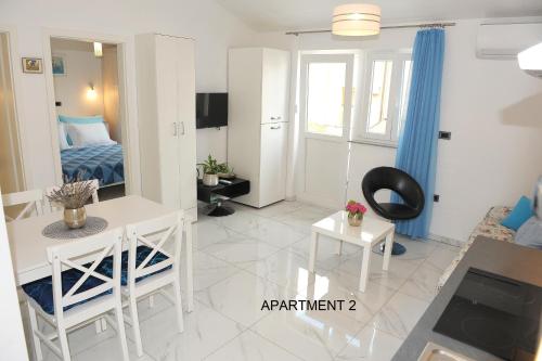 TV a/nebo společenská místnost v ubytování ONDINA apartments