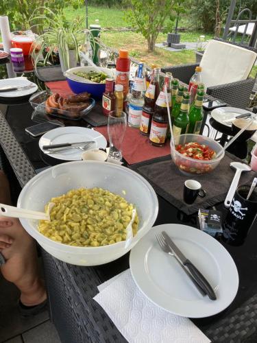 a table with a bowl of food on a table at Jeannette in Balingen