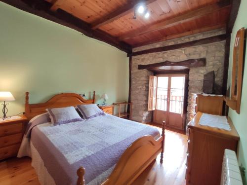 A bed or beds in a room at Casa Elvira