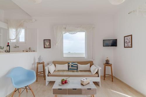 A television and/or entertainment centre at white house by the sea