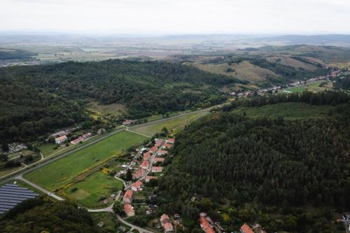 an aerial view of a park with trees and houses at Vidéki vendégház a Bükkben, pezsgőfürdővel. in Királd