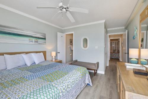 Ένα ή περισσότερα κρεβάτια σε δωμάτιο στο Sandy Getaway