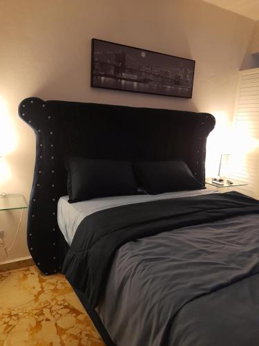 Postel nebo postele na pokoji v ubytování LK Apartamentos Amueblados