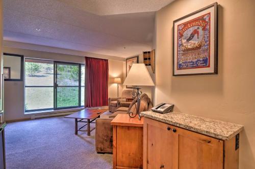 a living room with a couch and a table at Beaver Run Resort in Breckenridge