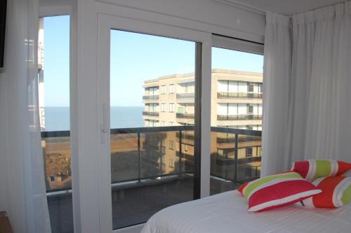 Llit o llits en una habitació de Duplex Penthouse Plaza