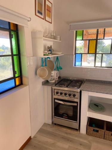 Una cocina o kitchenette en La Pelereca