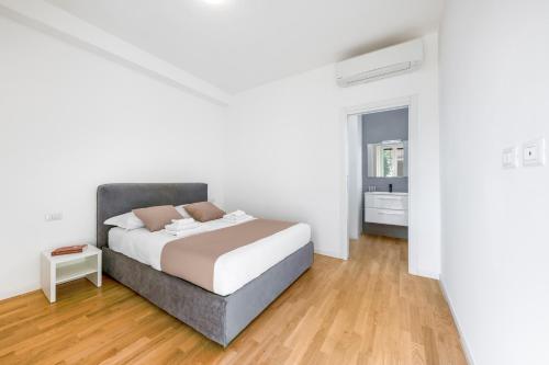 Posteľ alebo postele v izbe v ubytovaní Casa da Suite Centrale
