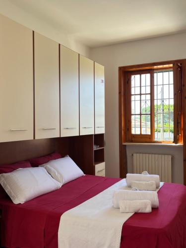 מיטה או מיטות בחדר ב-Monte Cuccu Bed & Breakfast