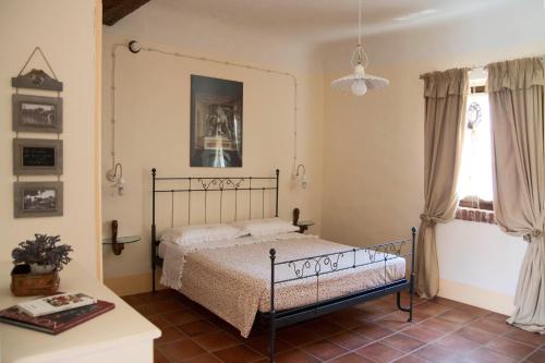 Posteľ alebo postele v izbe v ubytovaní B&B Il Giarolo
