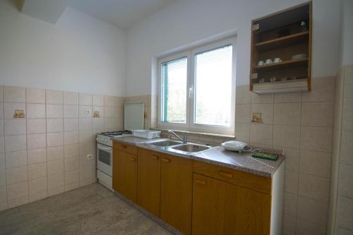Apartments with parking space Trogir - 15316
