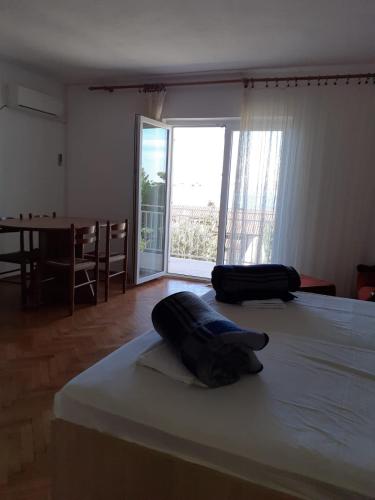 Apartments with a parking space Novi Vinodolski - 15412