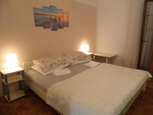 Postel nebo postele na pokoji v ubytování Apartments with a parking space Supetarska Draga - Donja, Rab - 15423