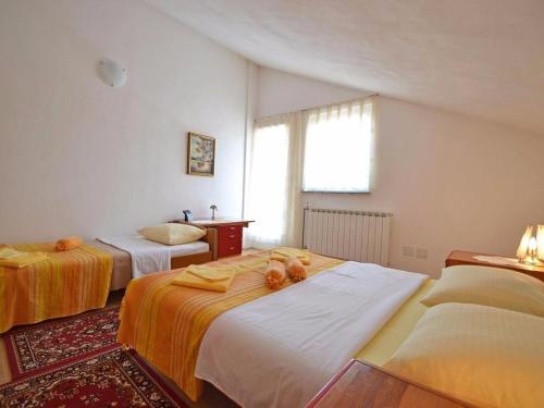 Postel nebo postele na pokoji v ubytování Apartments with a parking space Rakovica, Plitvice - 15514