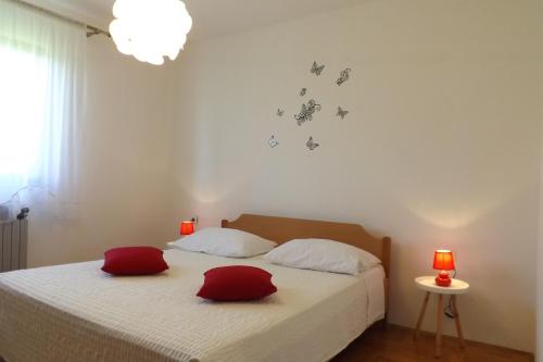 Ένα ή περισσότερα κρεβάτια σε δωμάτιο στο Apartments with a swimming pool Cepic, Central Istria - Sredisnja Istra - 15542