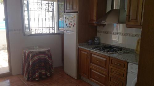 Huerta La Niña Arenasにあるキッチンまたは簡易キッチン