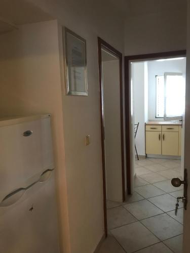 Apartments by the sea Primosten - 15704