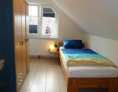 Postel nebo postele na pokoji v ubytování Keno