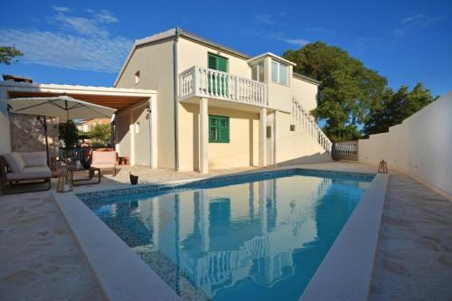 Holiday house with a swimming pool Pozorac, Trogir - 15565