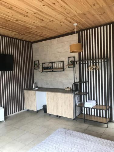 a room with a desk and a shelf in a room at Relax villa Poduzska in Sinyak