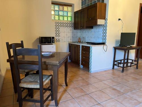 Kuchyň nebo kuchyňský kout v ubytování Agriturismo I Pietrini