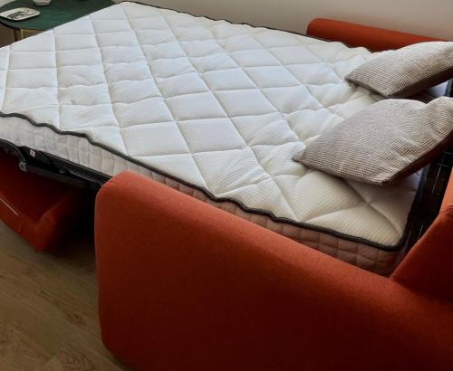 Un pat sau paturi într-o cameră la Appartement de charme - Cholet Centre