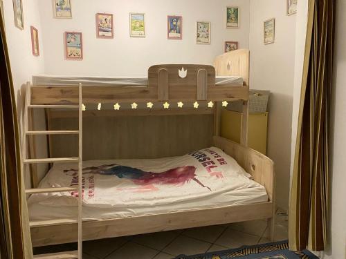 a bunk bed room with two bunk beds at Árpád nyaralóház in Sarud