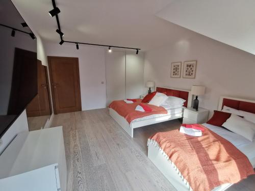 Ένα ή περισσότερα κρεβάτια σε δωμάτιο στο Paula Wellness & SPA