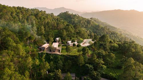 an aerial view of a house on a hill at Amaya Life Kasauli in Kasauli
