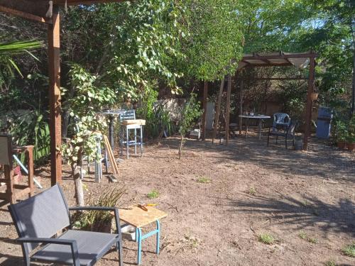 a group of chairs and tables in a yard at Nicosia rest and relax 1 bedroom apartment in Nicosia