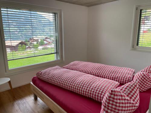 Postel nebo postele na pokoji v ubytování Schwarzhornblick