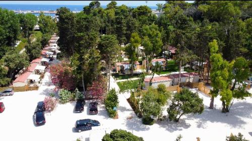 an aerial view of a parking lot with cars at Baia Dei Micenei in Otranto