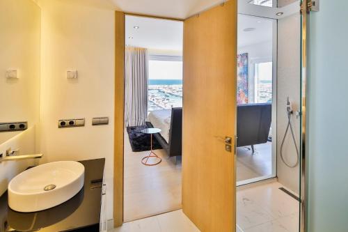 a bathroom with a toilet and a sink and a mirror at 306 -Luxury Selection- Puerto Banus Marbella Front Line Penthouse in Marbella