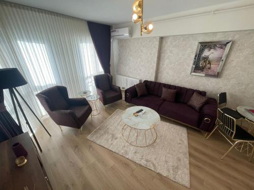 Ein Sitzbereich in der Unterkunft King Suite SS2