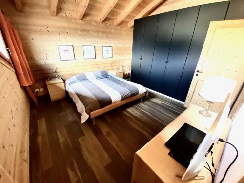 Postel nebo postele na pokoji v ubytování Chalet Les Dalton, Morgins