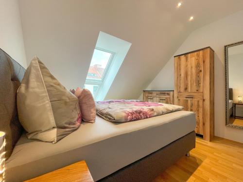 Postel nebo postele na pokoji v ubytování Stylisches Apartment in Grazer Bestlage