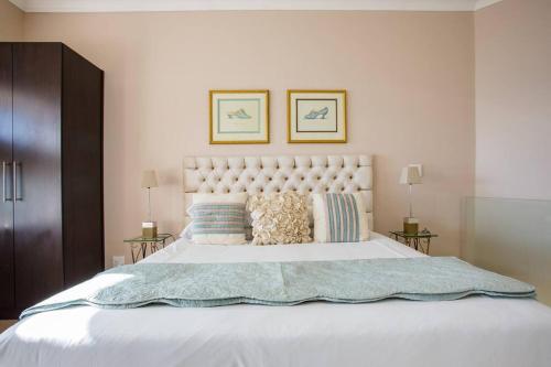 Aqua Terra Boutique Guesthouse - Simon's Town, Cape Townにあるベッド