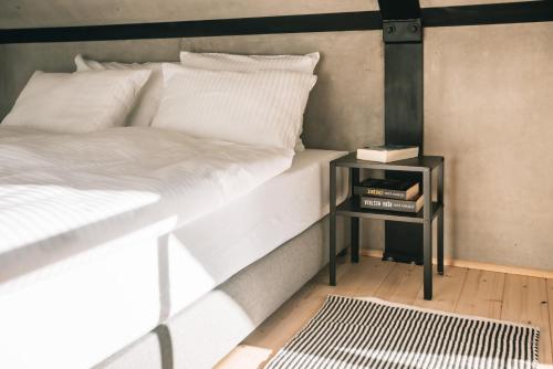 מיטה או מיטות בחדר ב-Projekt Cuberniok