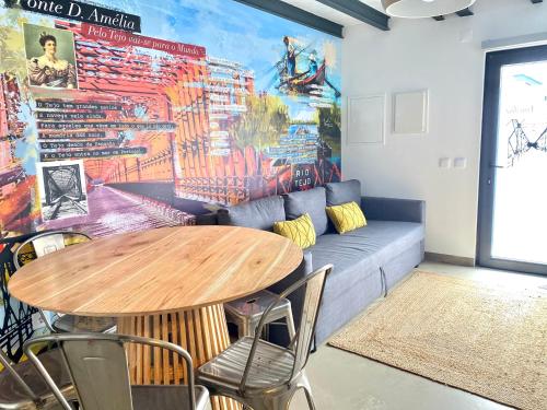 a living room with a table and a couch at Villa Rio by Valada Village in Valada