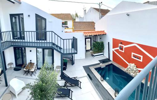 an aerial view of a house with a swimming pool at Villa Rio by Valada Village in Valada