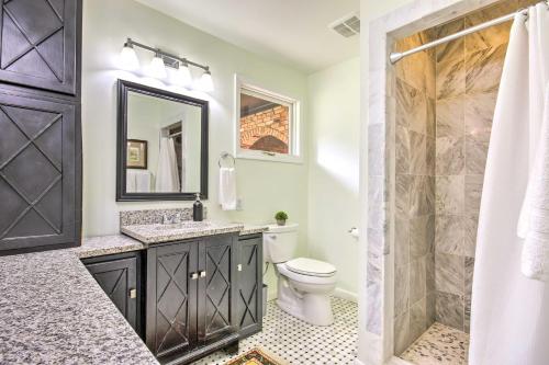 a bathroom with a sink and a toilet and a shower at Charming Retreat about 1 Mi to Augusta National! in Augusta