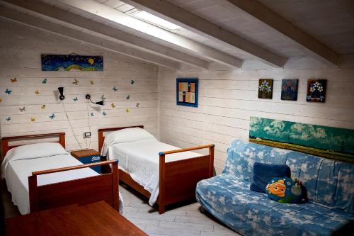 Ένα ή περισσότερα κρεβάτια σε δωμάτιο στο Villa Con Piscina Vista Mare