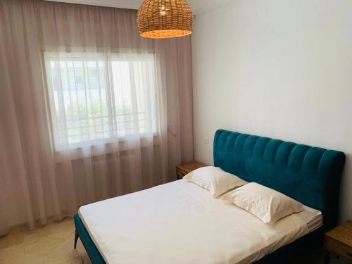 Postel nebo postele na pokoji v ubytování The Perfect Flat, Lac 2, Tunis