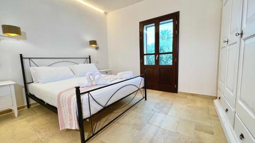 Ένα ή περισσότερα κρεβάτια σε δωμάτιο στο La Casa di Natalie