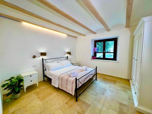 Ένα ή περισσότερα κρεβάτια σε δωμάτιο στο La Casa di Natalie
