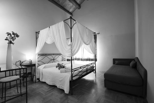 Postel nebo postele na pokoji v ubytování Agriturismo Lama Di Valle Rosa
