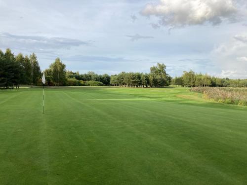 a view of the green at the golf course at Augusta lodge in Wisbech