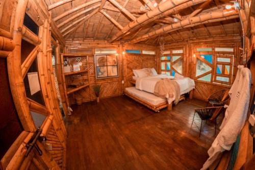 an overhead view of a bedroom in a tree house at Ecohotel Tierra de Agua in Cocorná