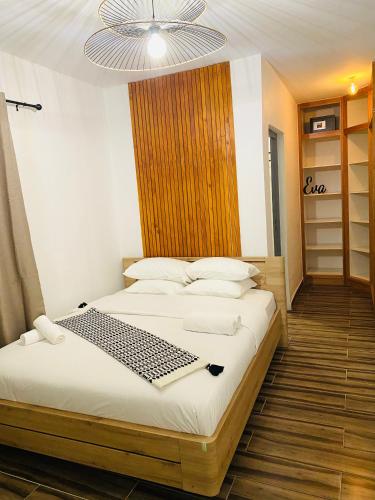 Postel nebo postele na pokoji v ubytování Moya Résidence by MD